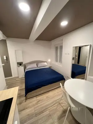 Letto o letti in una camera di Residence della Accademia