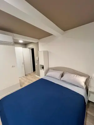 Letto o letti in una camera di Residence della Accademia