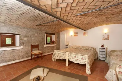 Letto o letti in una camera di Agriturismo Ca' del Ciuco