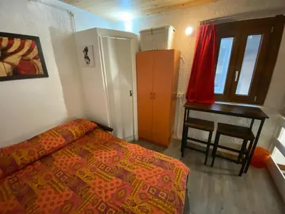 Letto o letti in una camera di Mini House centro storico Duomo di Pavia