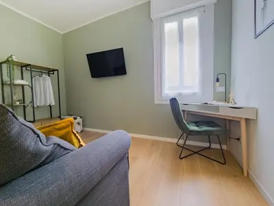 TV o dispositivi per l'intrattenimento presso Motor Valley Boutique Apartment - 3 Suites