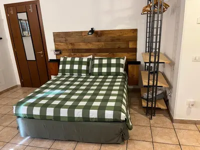 Letto o letti in una camera di Casa e Giardino Relax in Crema