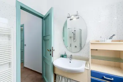 Bagno di 'Casa di Vivi' 300m from the beach Free Wifi Netflix