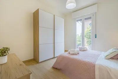Letto o letti in una camera di Mutina LuxLife Home close to Center - Free Parking