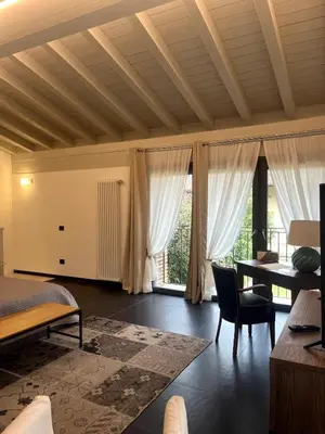 Letto o letti in una camera di Maison Jardin