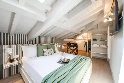 Letto o letti in una camera di Casa della Musica