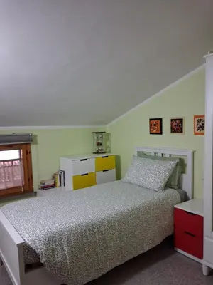 Letto o letti in una camera di Mansarda Montecavolo