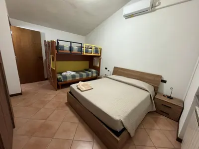 Letto o letti in una camera di Lucky House