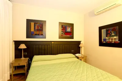 Letto o letti in una camera di Locanda Stella d'Oro