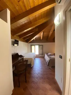 Letto o letti in una camera di Foresteria dell'Errante