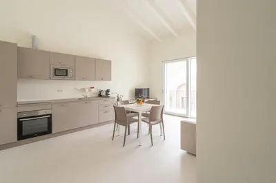 Cucina o angolo cottura di Nour Apartments - La Corte del Re