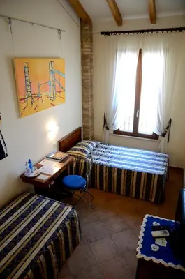 Letto o letti in una camera di 9 Muse Bed and Breakfast