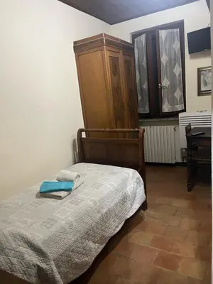 Letto o letti in una camera di Agriturismo La Brezza