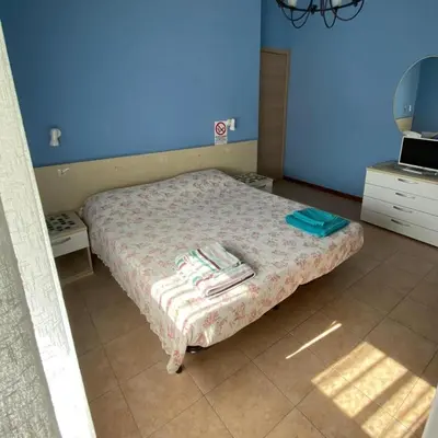 Letto o letti in una camera di CAMERE DI ARHET