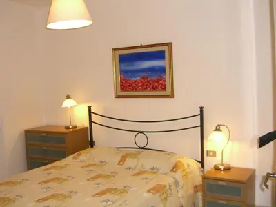 Letto o letti in una camera di La Piazzetta