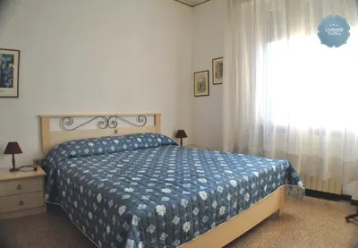 Letto o letti in una camera di Lombardi Abbeveratoia