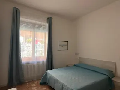 Letto o letti in una camera di Le Terre del Golfo Rooms