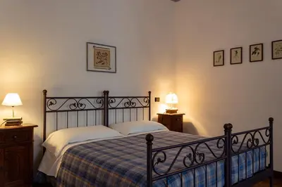 Letto o letti in una camera di Agriturismo Cà Rossa
