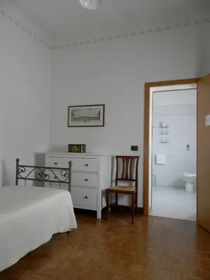 Letto o letti in una camera di Agriturismo Cà Rossa