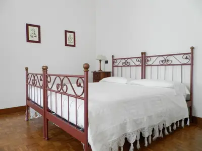 Letto o letti in una camera di Agriturismo Cà Rossa
