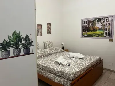 Letto o letti in una camera di La tana moderna
