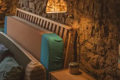 Letto o letti in una camera di Alloro loft storico