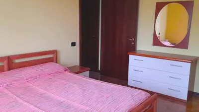 Letto o letti in una camera di Confortevole appartamento a Reggio Emilia