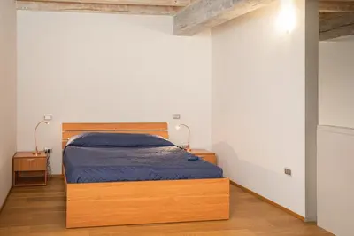 Letto o letti in una camera di Appartamento Siliprandi