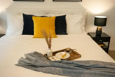 Letto o letti in una camera di Dehor in pieno centro - Piazza XX Settembre