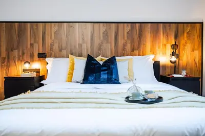 Letto o letti in una camera di Casa Luce - bright, stylish and central