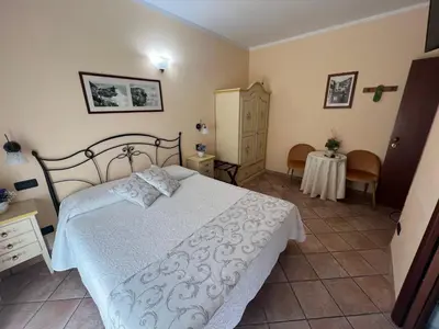 Letto o letti in una camera di Il Timone Loreto