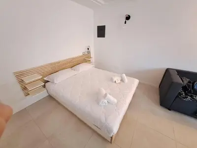 Letto o letti in una camera di FuoriPorta Affitti Brevi - Le Petit Arc