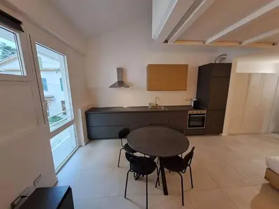 Cucina o angolo cottura di FuoriPorta Affitti Brevi - Le Petit Arc