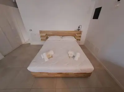 Letto o letti in una camera di FuoriPorta Affitti Brevi - Le Petit Arc