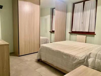 Letto o letti in una camera di Il Tulipano alloggio turistico