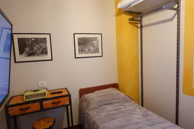 Letto o letti in una camera di La Foresteria della Beppa