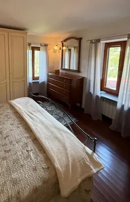 Letto o letti in una camera di La Casetta Valdonica La Spezia