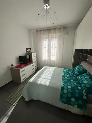Letto o letti in una camera di Appartamento Loreto-Fiera
