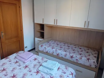 Letto o letti in una camera di Noemi Apartment 5 Lands Paradise