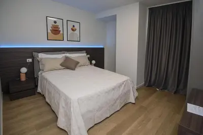 Letto o letti in una camera di Franciacorta Karting Rooms