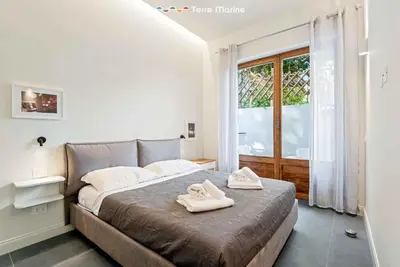 Letto o letti in una camera di Eco del Cuore, Terre Marine