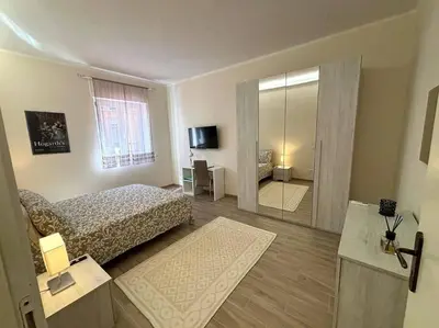 Letto o letti in una camera di A due passi da Piazza Cavalli