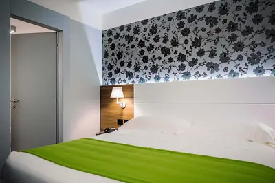 Letto o letti in una camera di Link124 Hotel