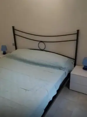 Letto o letti in una camera di da Paolone