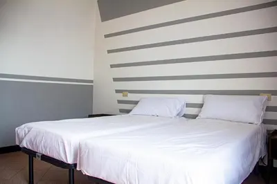 Letto o letti in una camera di Camere della Perla
