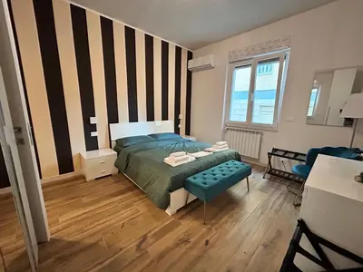 Letto o letti in una camera di Pop House