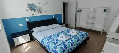 Letto o letti in una camera di Casa Carlotta - mytouristhome