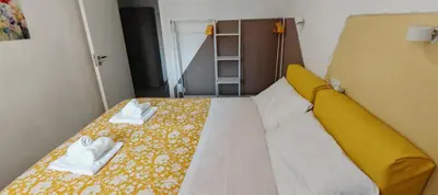 Letto o letti in una camera di Casa Carlotta - mytouristhome