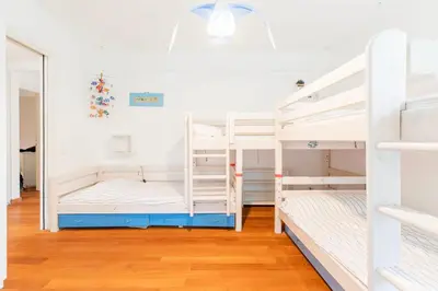 Letto o letti in una camera di Casa Marchelli