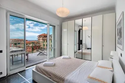 Letto o letti in una camera di Attico in centro vista mare